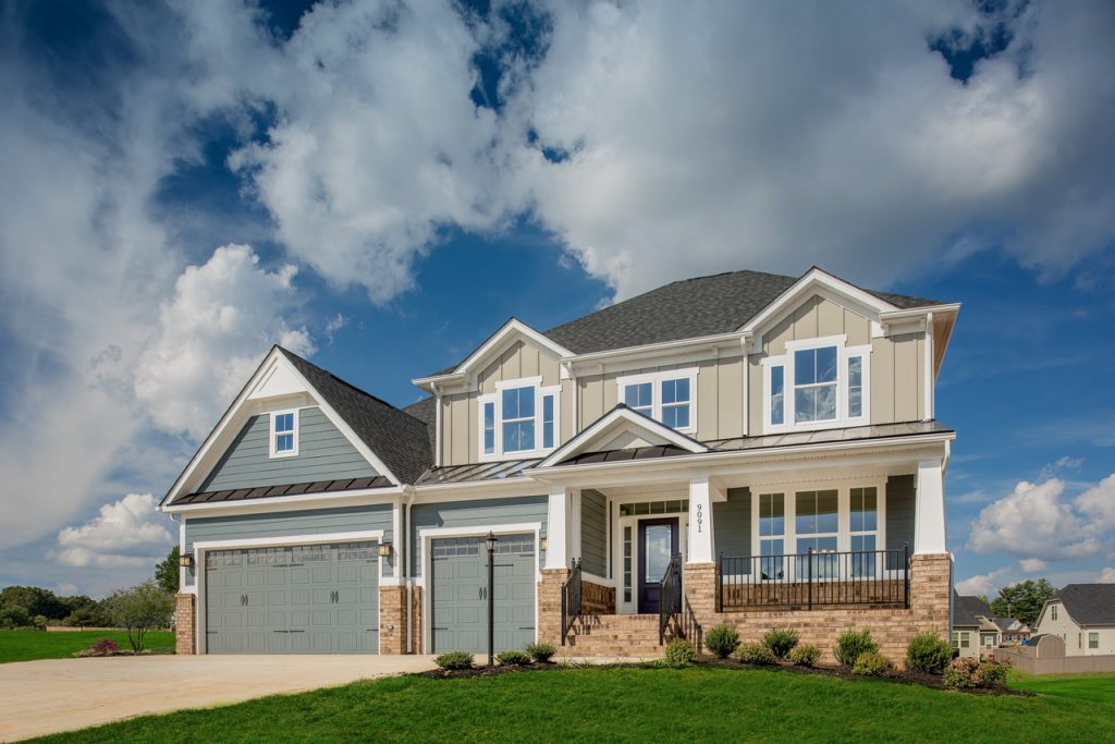 Home Exterior With Stone and Hardie Siding